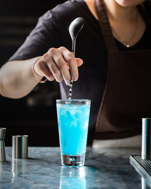 Professional staff serving refreshments at an elegant bar